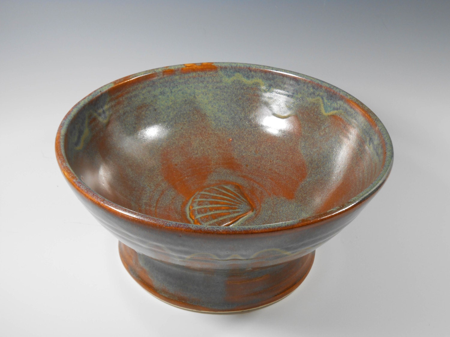 Baptismal bowl with scallop design in red brown and blue green