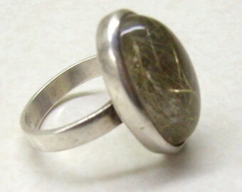 Items similar to Ring.brass.sterling silver.size 7. jewelry by isajul