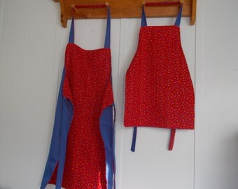 Apron sets, Mommy and me aprons reversible Blue and Red with shooting stars
