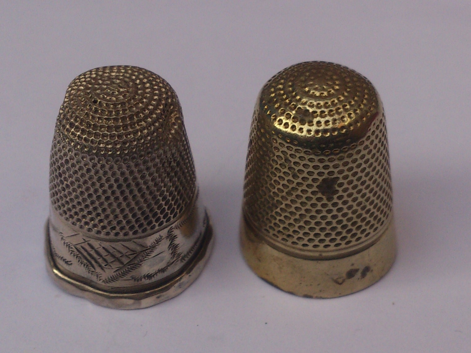 Two vintage thimbles