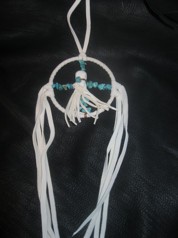 Native American medicine wheel with turquoise stones