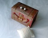 Wooden jewelry box painted in red