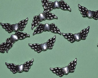 15 - Tibetan Silver Winged Heart beads (3026041)