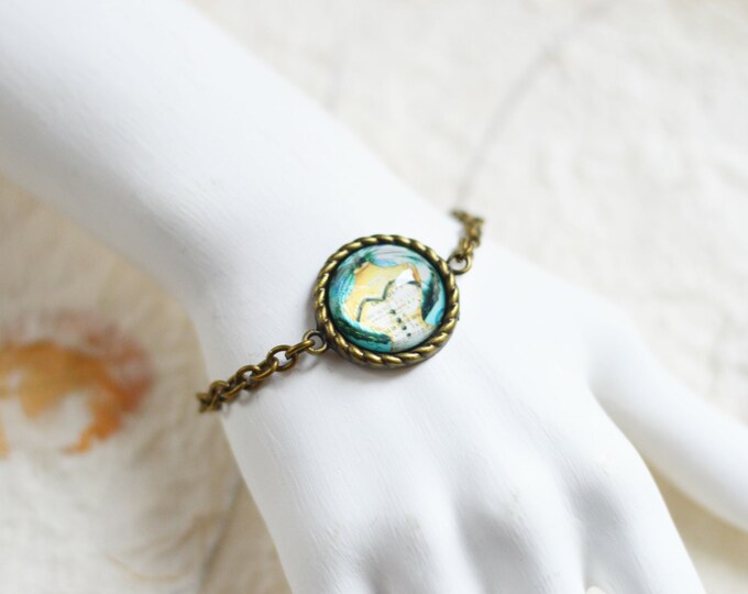LADY BUTTERFLY Bracelet metal brass with the image of the girl-butterfly under glass