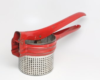 1950's Food Ricer/Masher. Red and Unpainted Tin. Hand Operated Kitchen Utensil