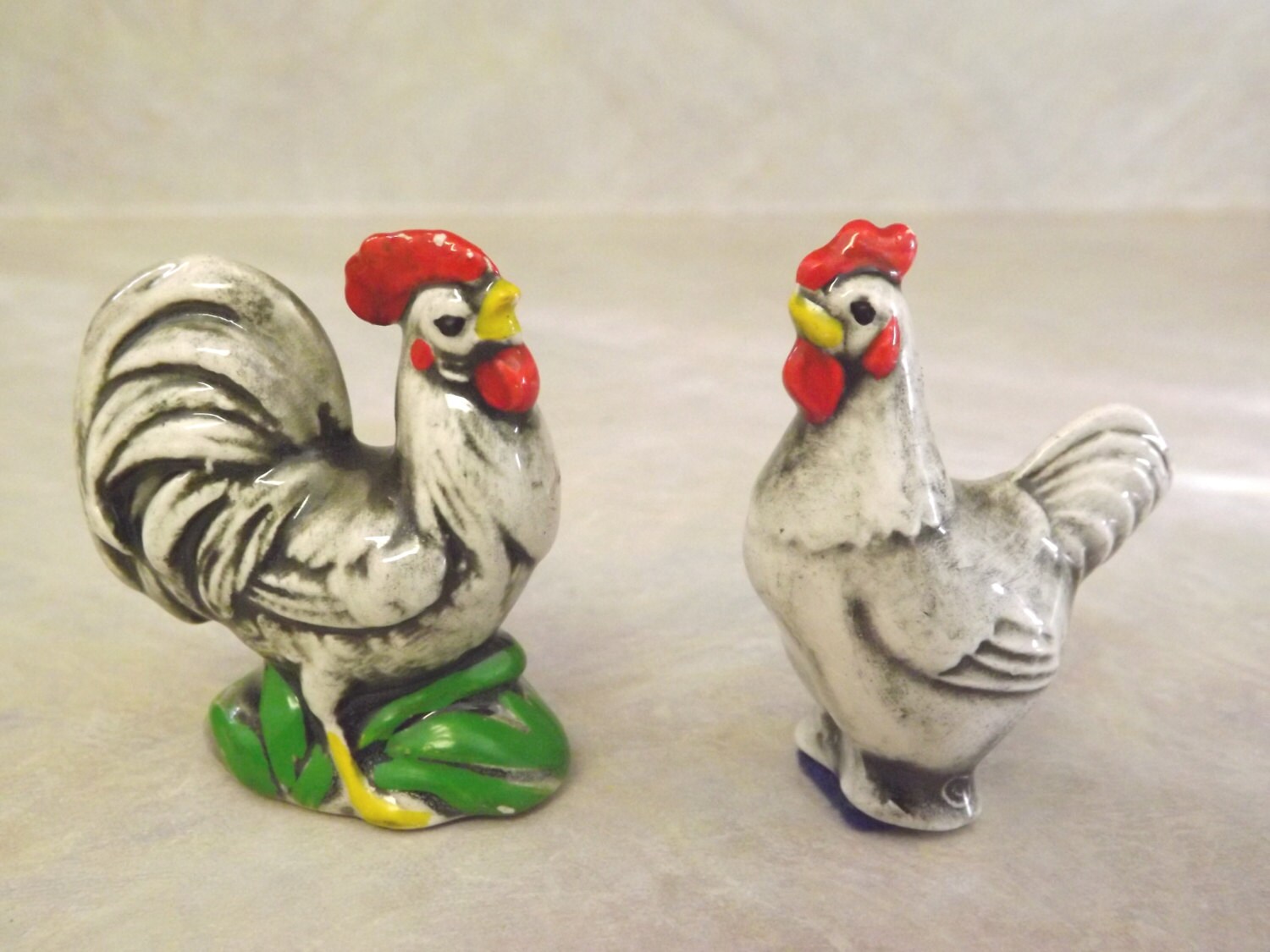 hen and rooster figurines