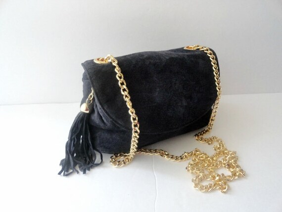 navy and gold handbag