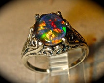 black opal and tanzanite wedding rings