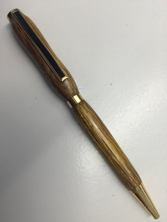 Items similar to Hand turned wood pen on Etsy