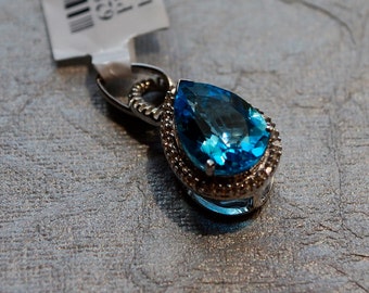 Pear Shaped Blue Topaz and Diamond Pendant Set in Sterling Silver