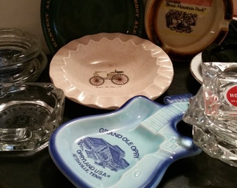 Twelve Advertising Ashtrays