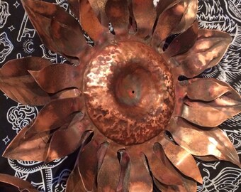 Copper sunflower sculpture made from upcycled boiler