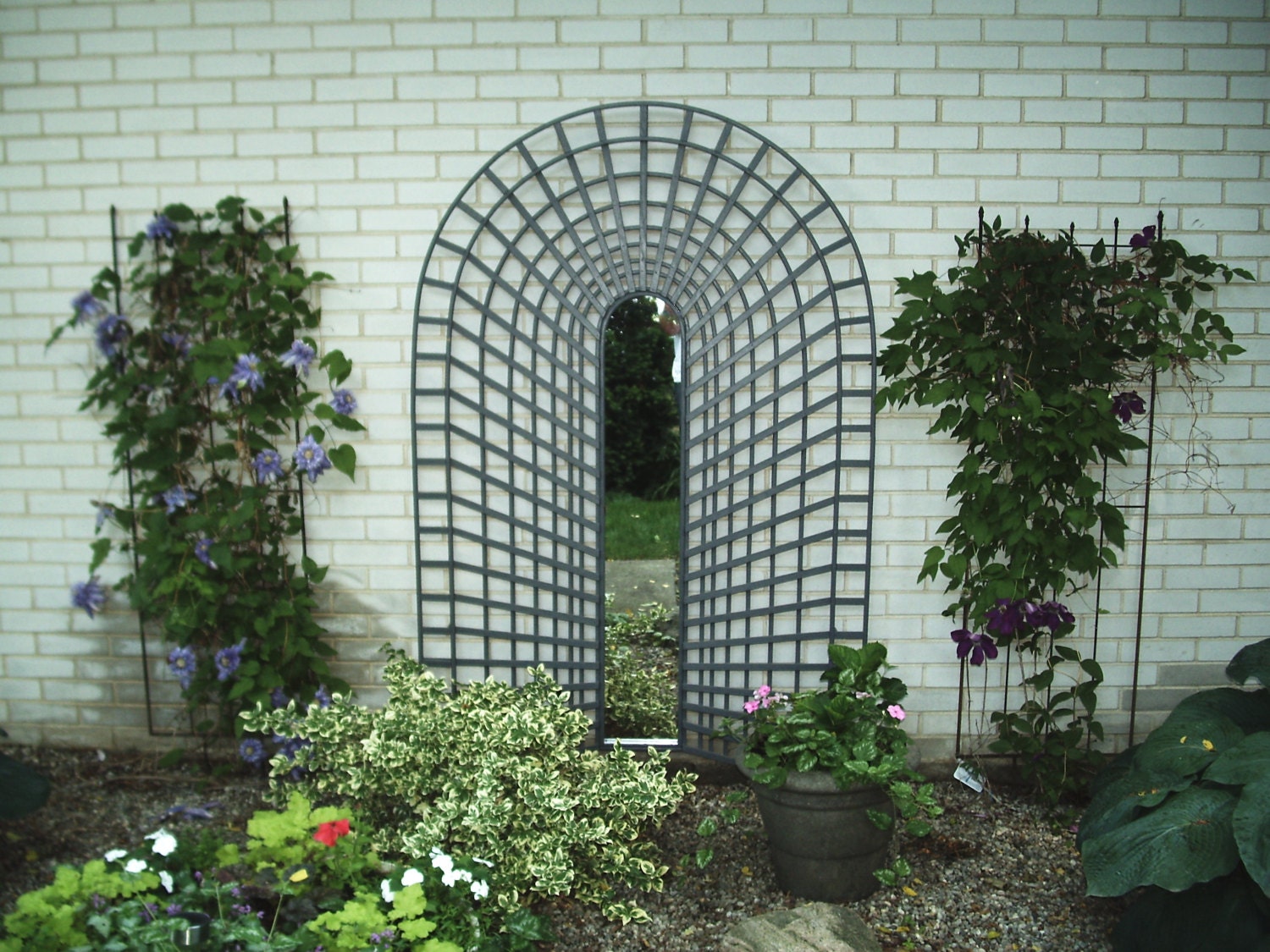 3-D trompe L'oeil garden trellis with mirror