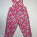 80s/90s Oshkosh pink floral overalls with criss cross back 3T