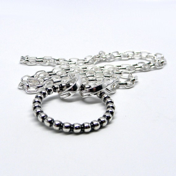 O Symbolic Slave necklace on 3.2mm Sterling by MockingbirdLaneWire