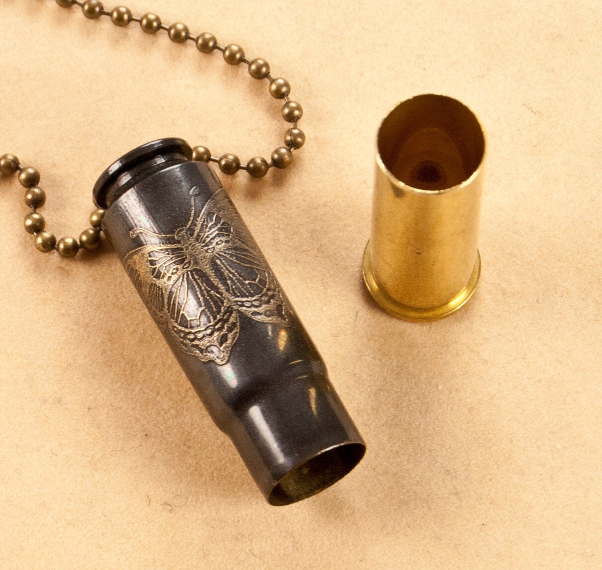 Time capsule necklace Butterflies etched bullet casing by Dazzlez