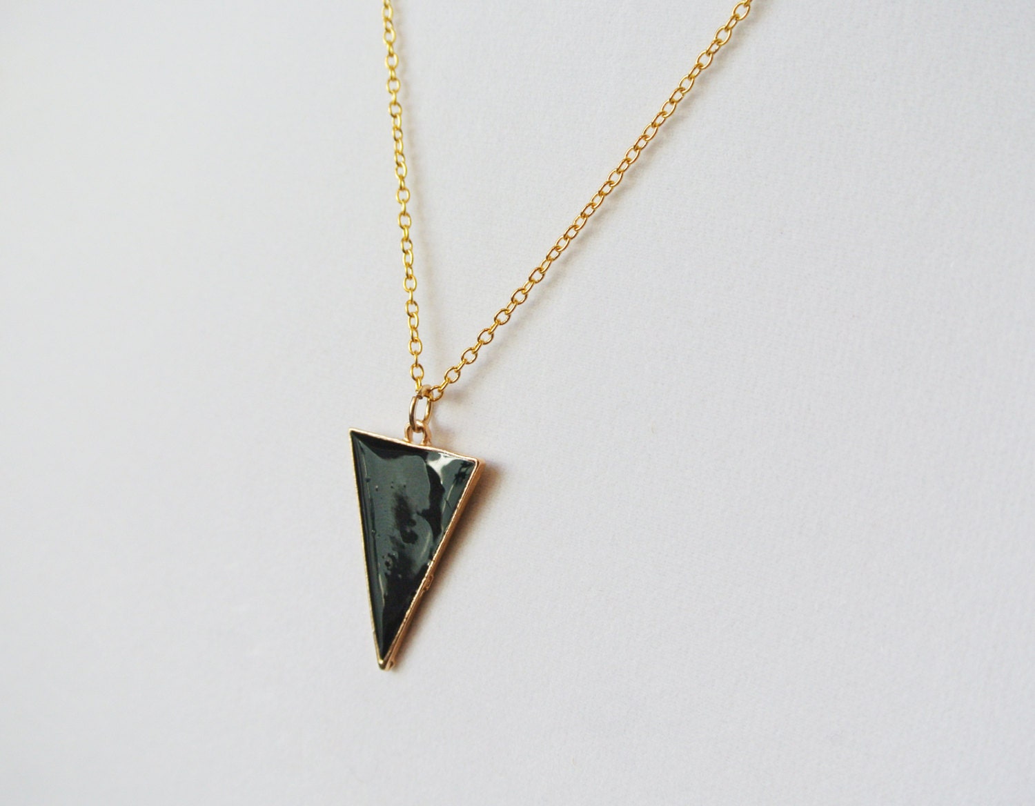 enameled triangle pin with saffiano trim