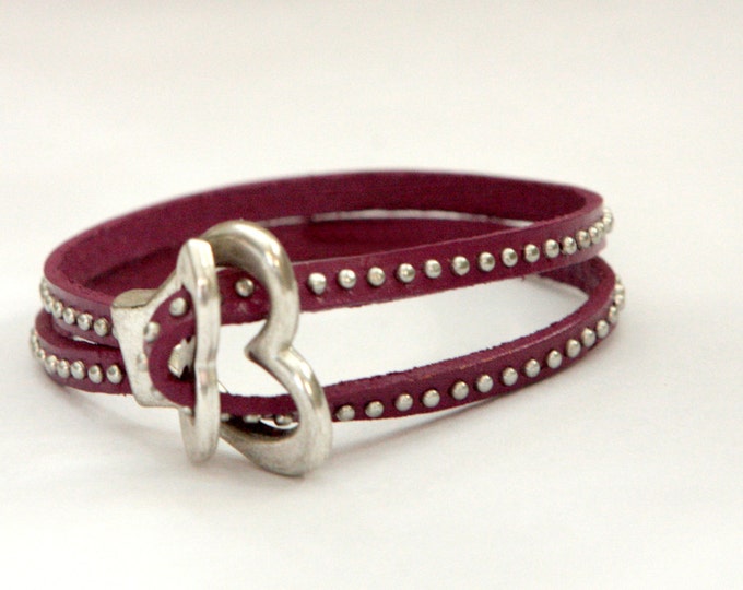 Women studded leather cuff bracelet with heart shape toggle clasp