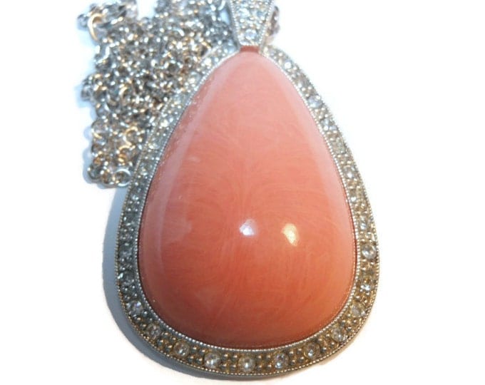 FREE SHIPPING Avon Pale Fire pendant from 1974 with coral peach marble colored tear drop cabochon with silver chain and rhinestone edging