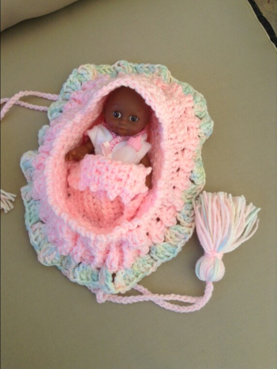 Pink crochet cradle purse with adorable african american baby