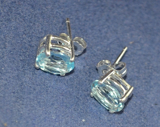 Sky Blue Topaz Studs, 8x6mm Oval, Natural, Set in Sterling Silver E716