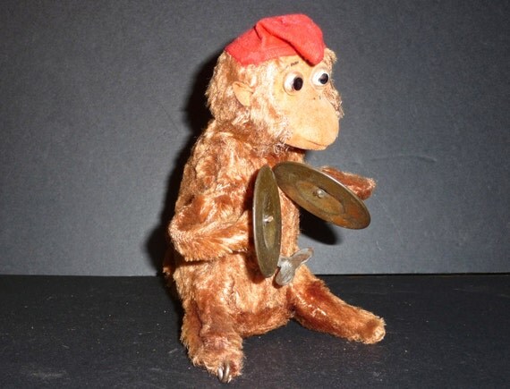 stuffed monkey with cymbals