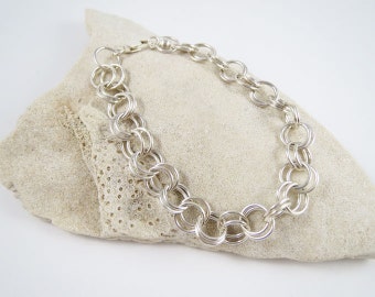 Sterling Silver Bracelet Simple But Elegant .925 Sterling Silver Chain Bracelet with sterling silver parot clasp. Great gift