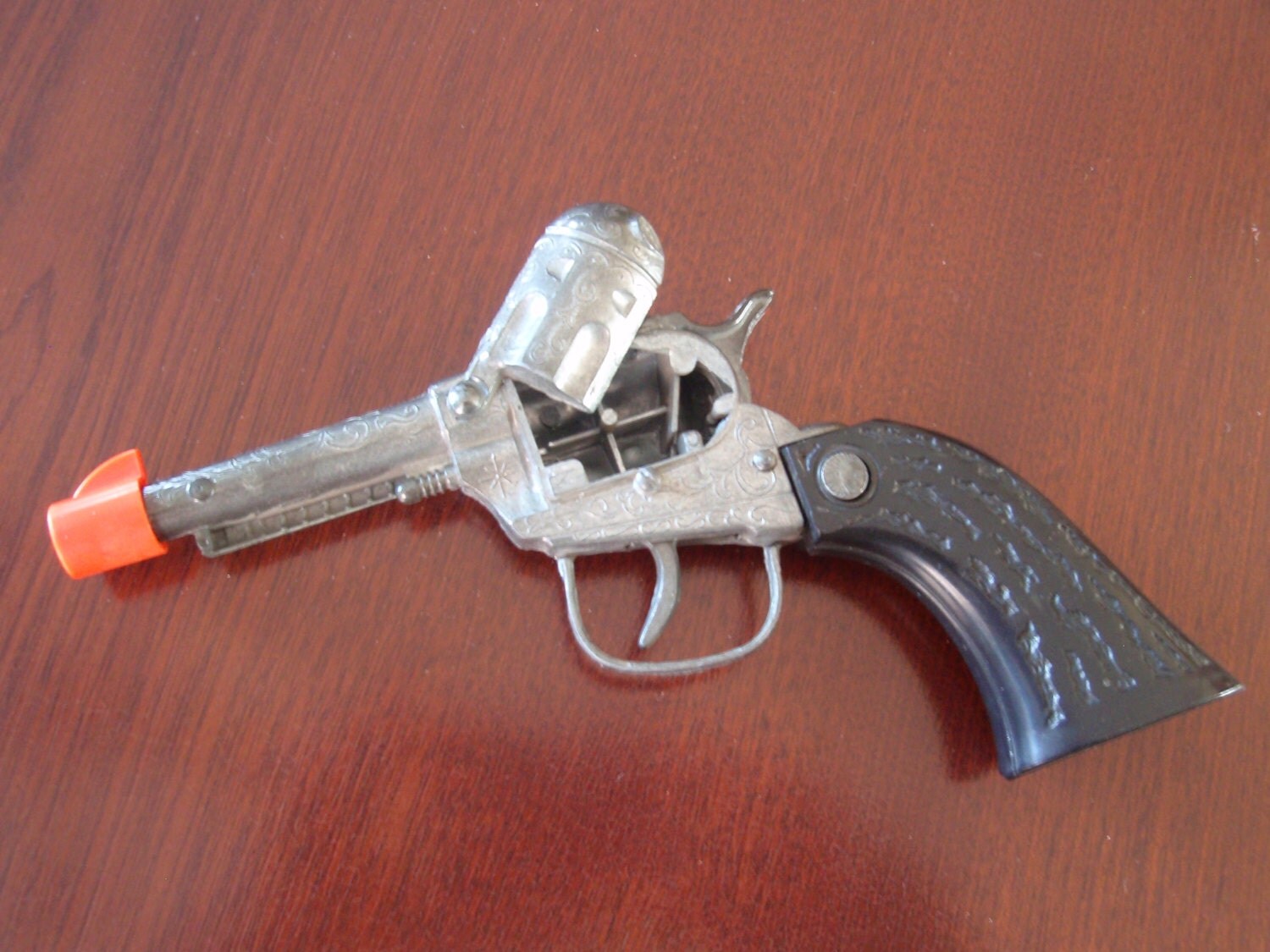 Childs Toy Metal Cap Gun Indian Chief Insignia on the Black