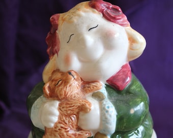 Vintage Old and Chubby Lady Holding a Dog Piggy Bank by WCL
