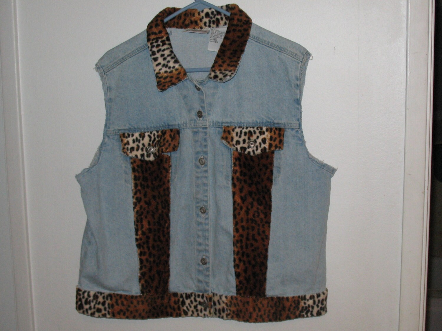 Woman's denim vest with Leopard print trimming by TheStudDoctor