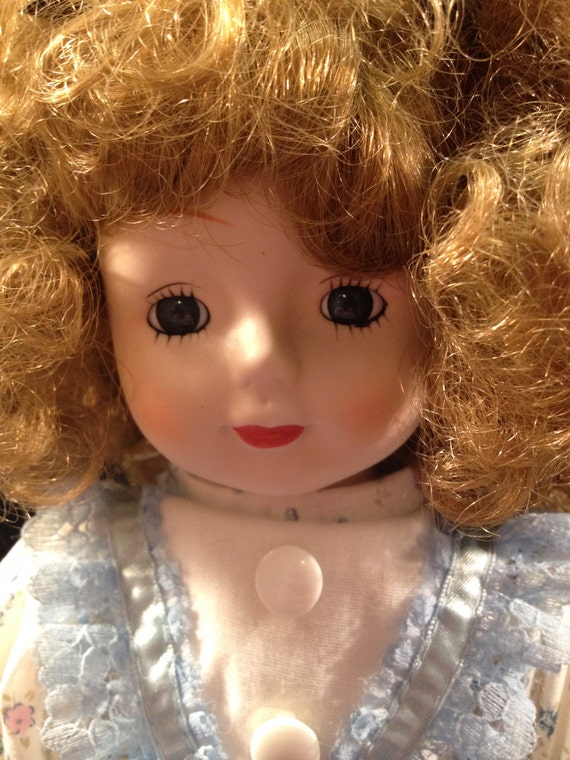 Vintage Porcelain Doll with Curly Light Golden Brown Hair