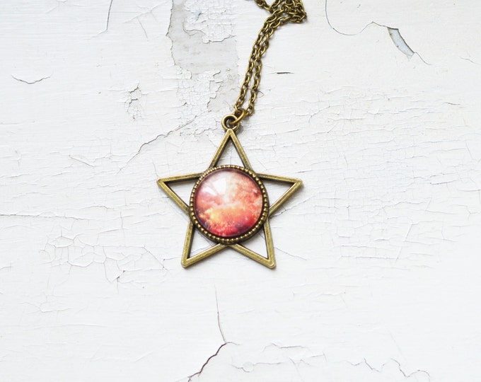 GALAXY // Pendant in the form of a star of metal brass with the image of Space under glass // Space, World // Pink, Red, Orange // Fashion