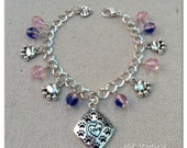Surrounded by paws charmed bracelet for dog, cat lovers, reacuers and adopters 