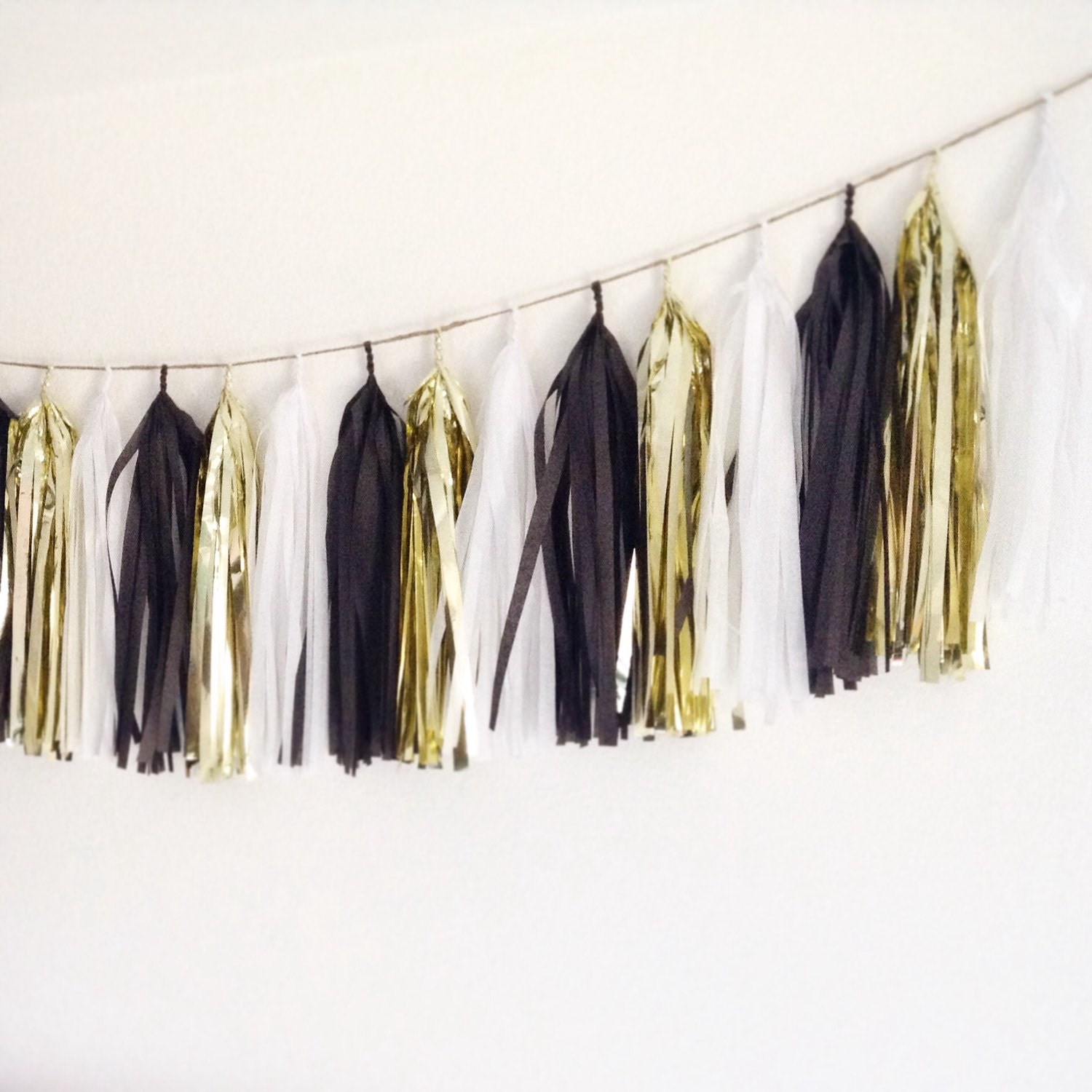 Gold black and white tissue paper tassel garland
