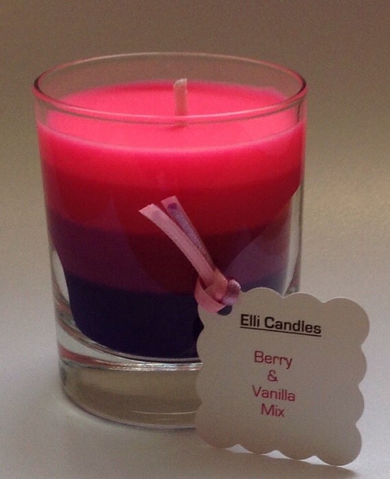 A beautiful 4-tone purple and pink candle with the by ElliCandles