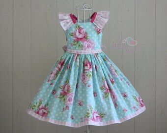 Posey Party Dress PDF Sewing Pattern by Ainslee Fox for confident beginners to sew for little girls size 1-12