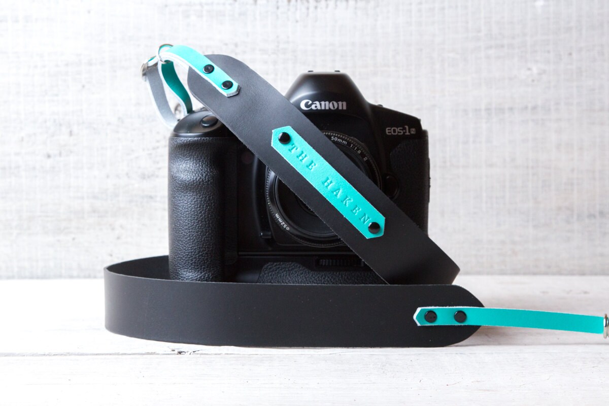 Personalized leather camera strap. Black with turquoise blue