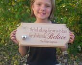 Items similar to Polar Express Wood Plaque with "Believe" Quote and Metal Bell on Etsy