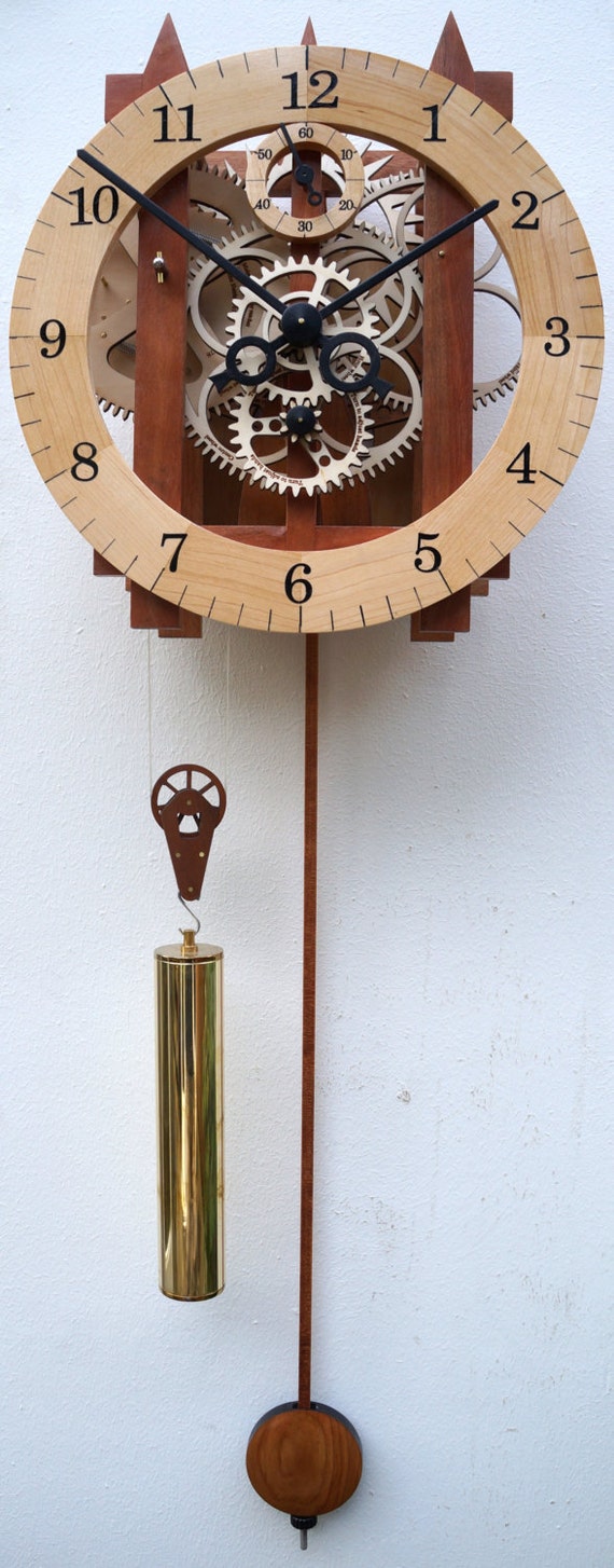 Large wooden mechanical skeleton wall clock with pendulum.