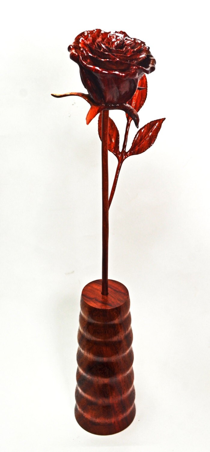 Rose carved in Padauk wood. This is a by MariesWoodCarvings