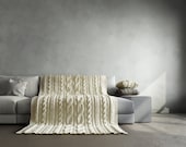 Milky white cable knit blanket. It fits perfect for bed and couch. Will be made to order.