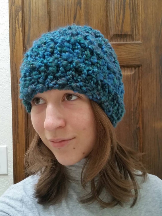 Finger knit hat in dark aqua