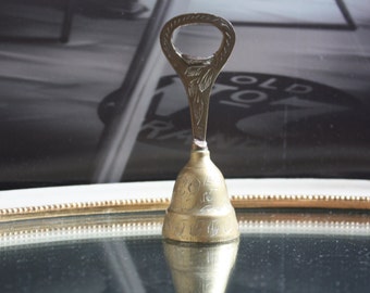 Vintage brass bell of Sarna India Bottle Opener