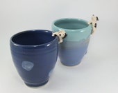pair of dog teacups