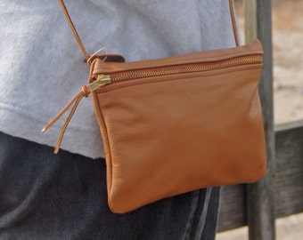 L6. Light Tan Leather Side Pouch with Zipper Closure
