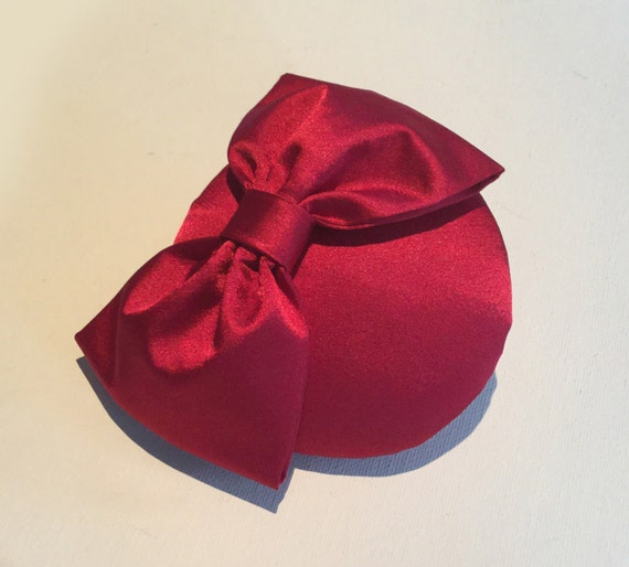 Red satin bow cocktail hat