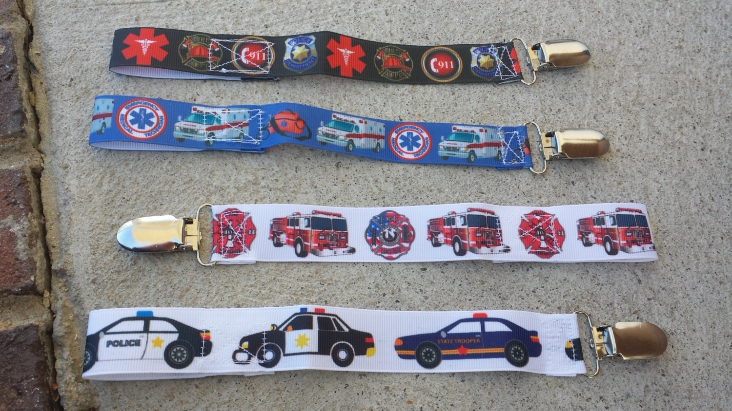 Emergency services pacifier clips