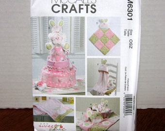 UNCUT McCall's 6301 Sewing Pattern Baby Craft Accessories Burp Cloth Cuddle Blankie Hooded Towel And More With Factory Folds