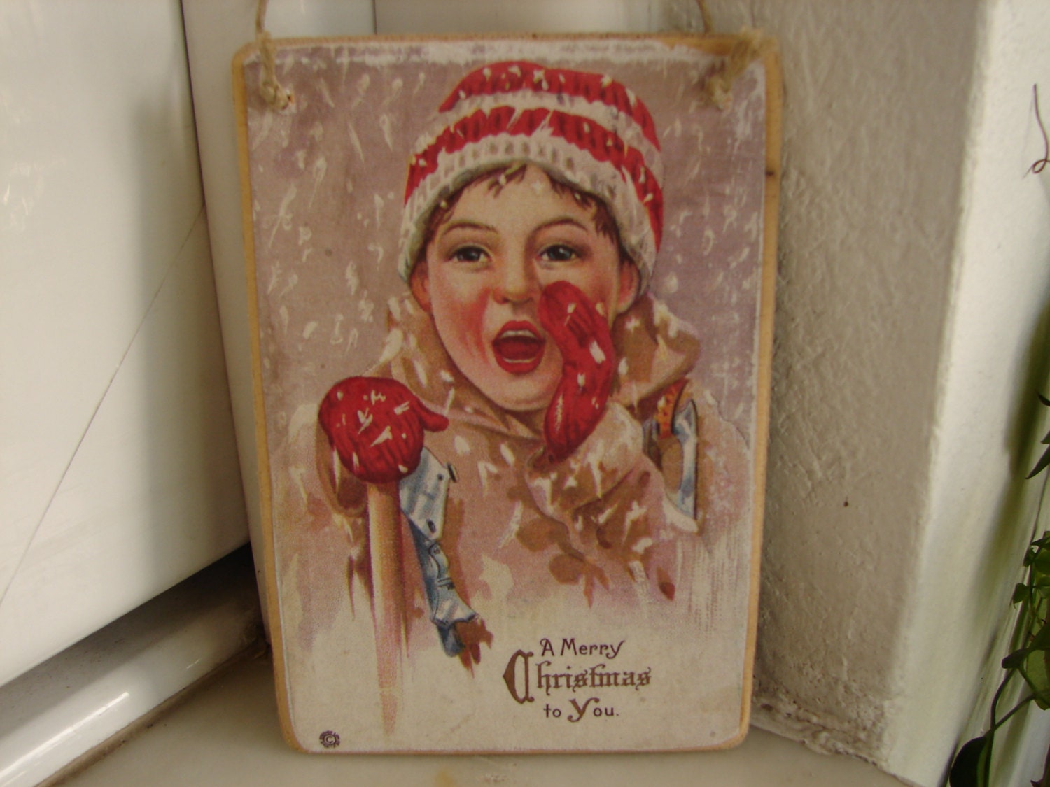 Girl dressed in woollies for snow,Christmas image, tree decoration-vintage image sealed onto wood-Holiday season