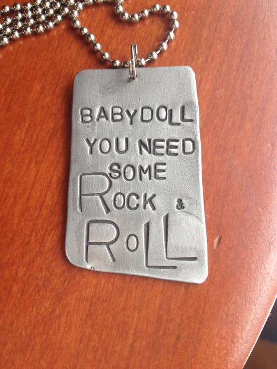 Items similar to Baby Doll You Need Some Rock and Roll Hand Stamped Metal Jewelry Pendant Art